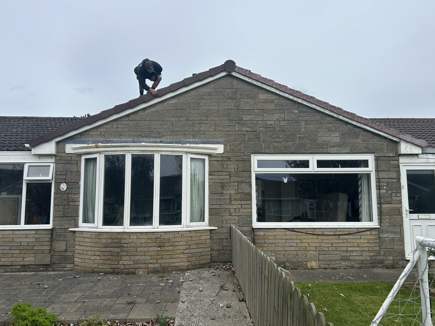 Roof replacement work underway on a residential property